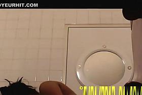 Latin girl drying and dressing after shower