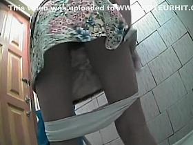 Close up view of a pissing hairy pussy