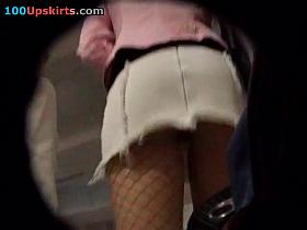 Amateur upskirt of the slim brunette