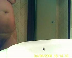 My wife naked in bathroom.