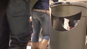 Street candid video features a tight hot ass i blue jeans.