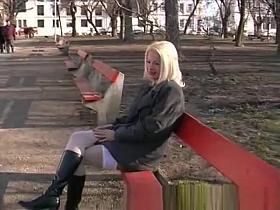 blonde girl peeing in public