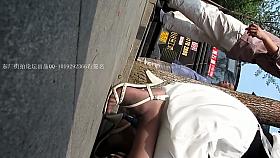 Impressive asses caught on an upskirt spy cam