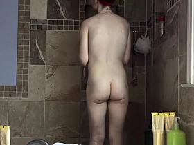 Milf with fake tits taking shower