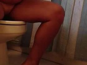 Girl gets naked on hidden cam.