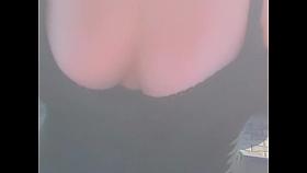 Amateur in top with low d&eacute;collet&eacute; out of lingerie downblouse