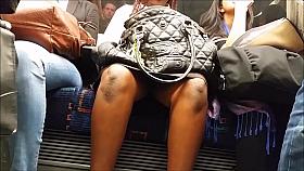 Bare legged teen upskirt on Tube