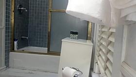 Girl with hairy cunt showering voyeured nude on spy cam