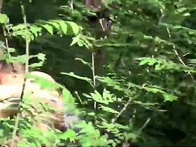 Drunk girl at a festival with group of men