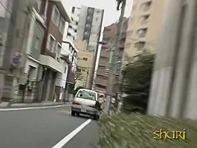 Asian babe has her pants removed by a expert street sharker.