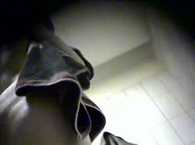 Babe is dressing her nude body on spy cam in changing room