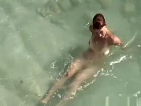 Young couple fucks in the water