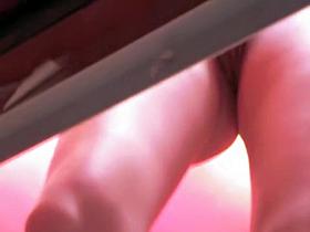 Erected clit between nub lips of changing room mature