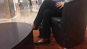 New girl Gina from marketing waits with me for a client