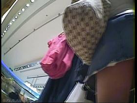 Hot shopaholics spied on by an upskirt voyeur