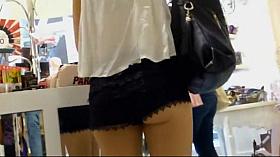 Ass cheeks falling out of lace shorts