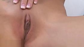 Brittany Bliss Sits In Blue Room On White Couch