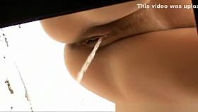 Woman with nice pussy caught pissing in hole