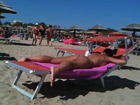 Worthy strap butt on the beach