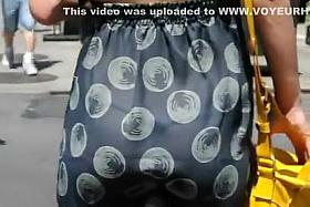 Seductive thong under her light dress