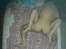 Spy cam catches a cheating couple having sex