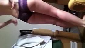 Woman dries and dresses while man films