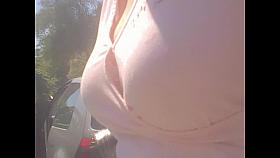 Fantastic big boobs down pink blouse shot in close up