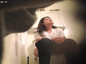 Sister's friend takes a long piss in the bathroom