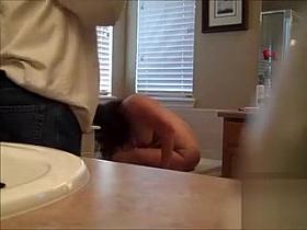 Wife shaves her genitals on the edge of the bathtub