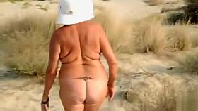 My wife is proud to be naked on the beach