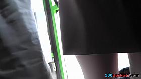 Black leather-style skirt on the upskirt tease tube