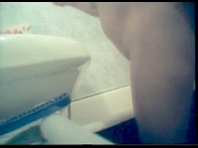 Chubby chick taking a shower candid spy video