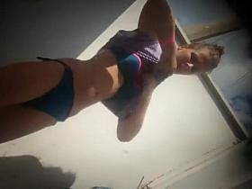 Teen girl dressing after a beach day