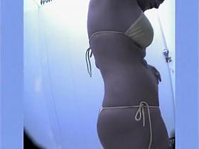 Peeping on big boobs and a shaved pussy