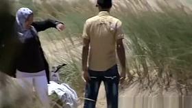 Couple fucking in dunes