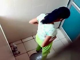 Indian coed girls get caught on tape using the university toilet