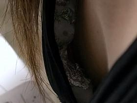 Asian cutie treats us to a down blouse view of her perky tits