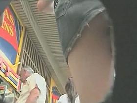 She is walking that street like a goddess in a black skirt