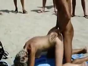Couple Fucks on a Public Beach with Audience