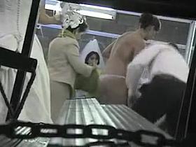 Peeping on the bride getting dressed