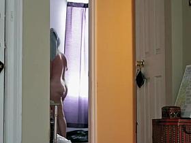 Naked woman caught walking out