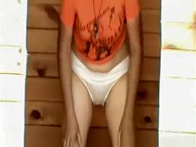 Women peeing wooden cabin