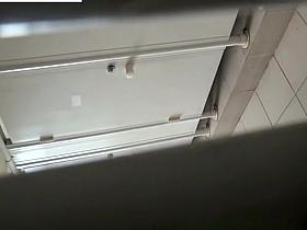 Voyeur hidden in public toilet catches asian