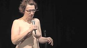 Mature dame delivers a speech while being completely naked