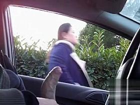 Sitting in a parked car and masturbating cock