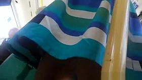 Woman in colorful dress upskirted