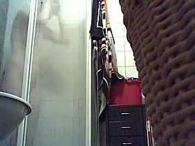 Bathroom spy cam records a blonde pissing and then showering