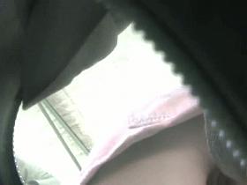 Sexy upskirt view with cute babe in pink skirt