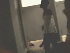 Amateur in black jeans and erotic silk bra of white color