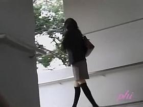Asian babe gets a nasty skirt sharking on a rainy day.